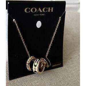 Coach Multi-Ring Pendant Necklace Gold Cream Black Enamel Crystal NWT 16”+2”
